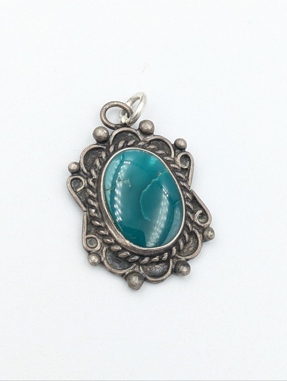 Vintage Southwest style metalwork pendant